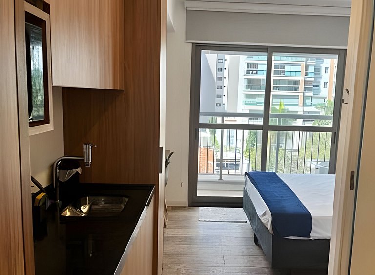 Studio com academia, rooftop e piscina (402)
