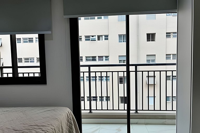 Studio com academia e coworking próx PUC (707)
